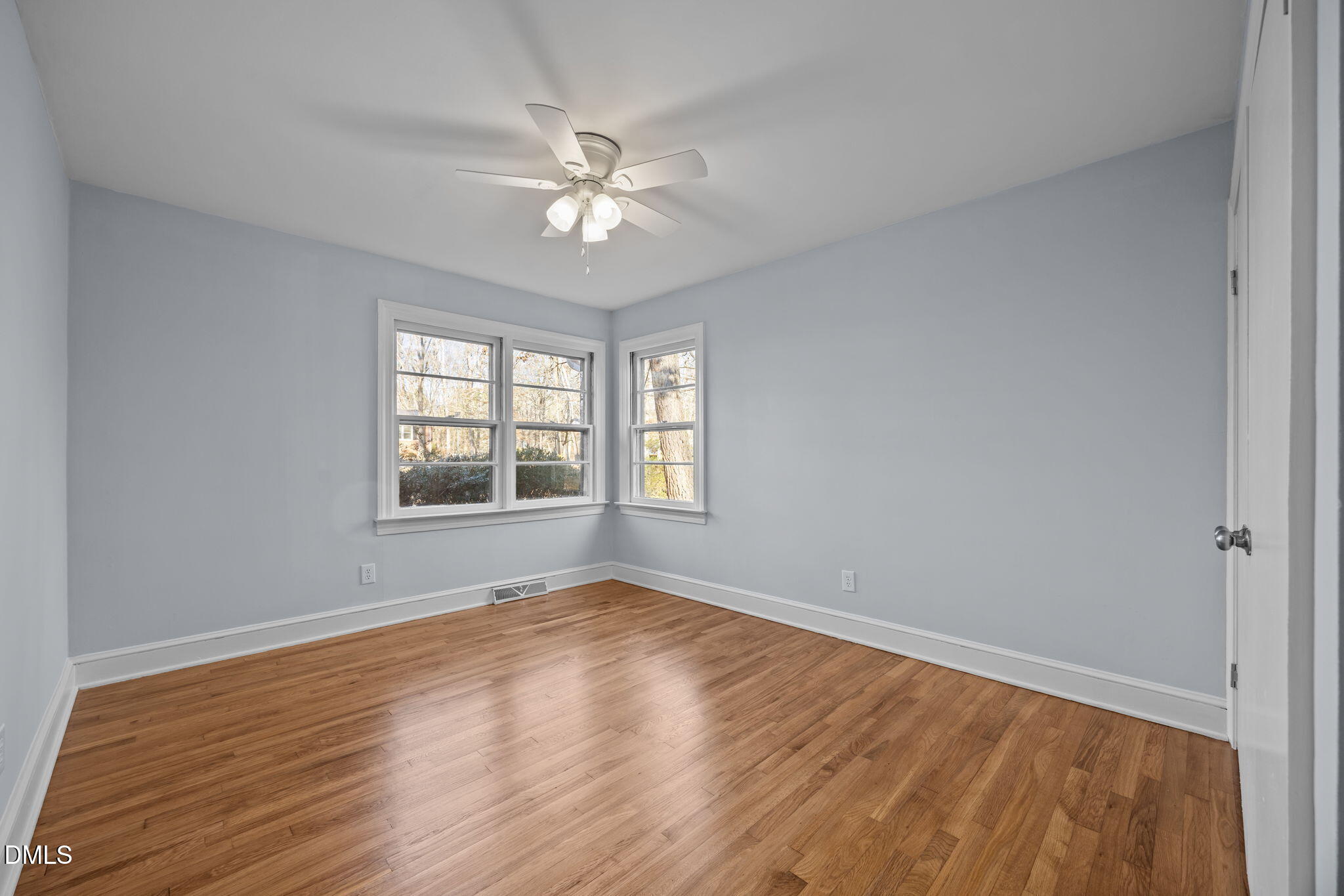 122 Ridgecrest Drive Warrenton, NC 27589 - Photo 36 of 48 a view of empty room with wooden floor and fan