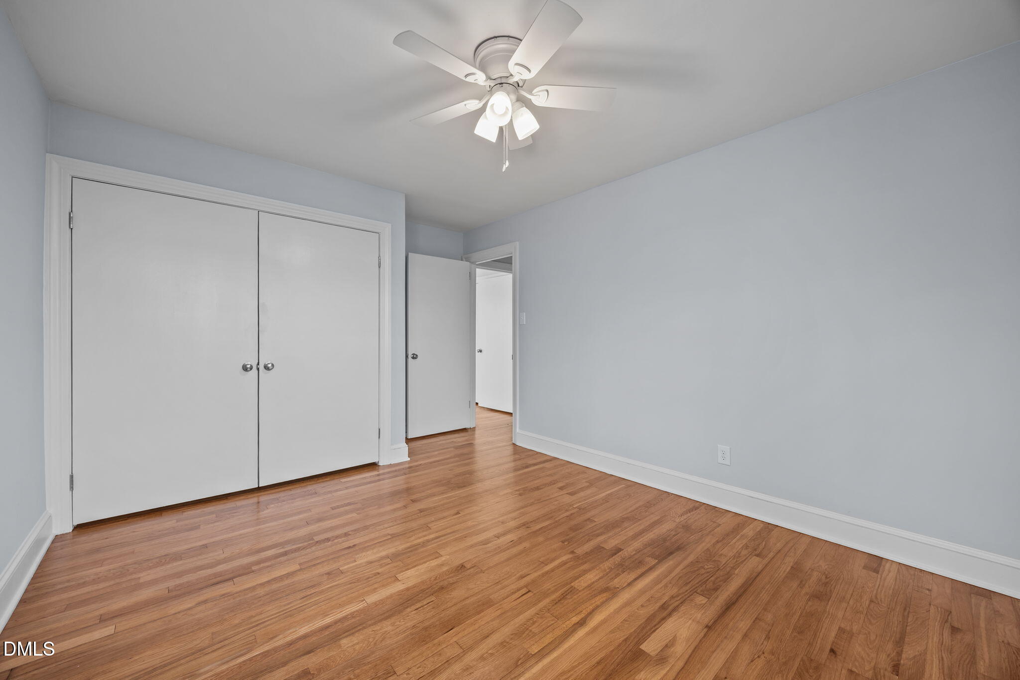 122 Ridgecrest Drive Warrenton, NC 27589 - Photo 37 of 48 a view of an empty room with wooden floor