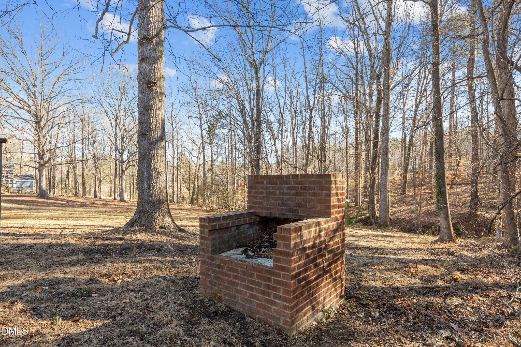 122 Ridgecrest Drive Warrenton, NC 27589 - Photo 9 of 48 a view of a bench in the backyard