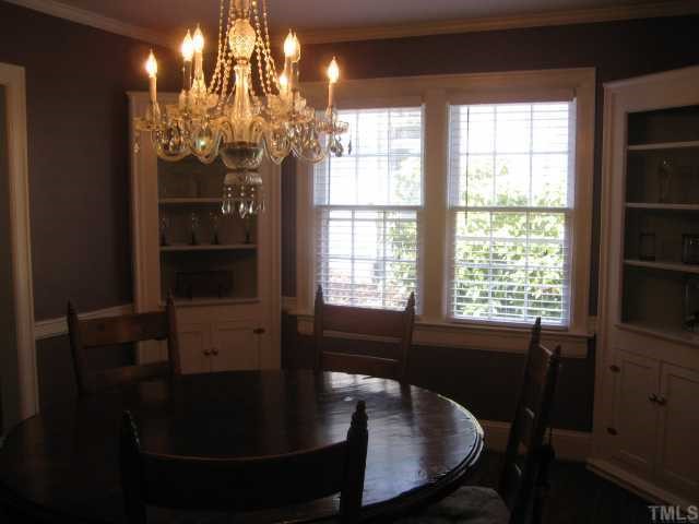 2709 Van Dyke Avenue Raleigh, NC 27607 - Photo 11 of 11 a view of a dining room with furniture and chandelier