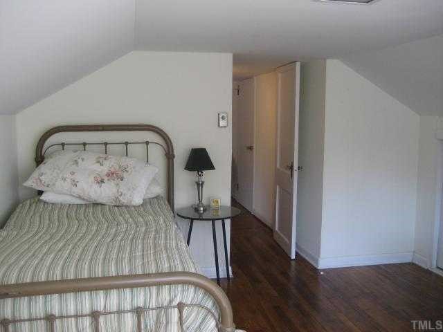 2709 Van Dyke Avenue Raleigh, NC 27607 - Photo 10 of 11 a view of a bedroom with wooden floor