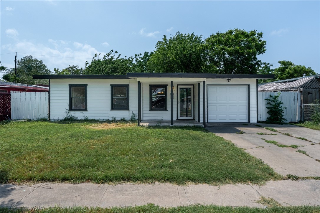front view of house with a yard