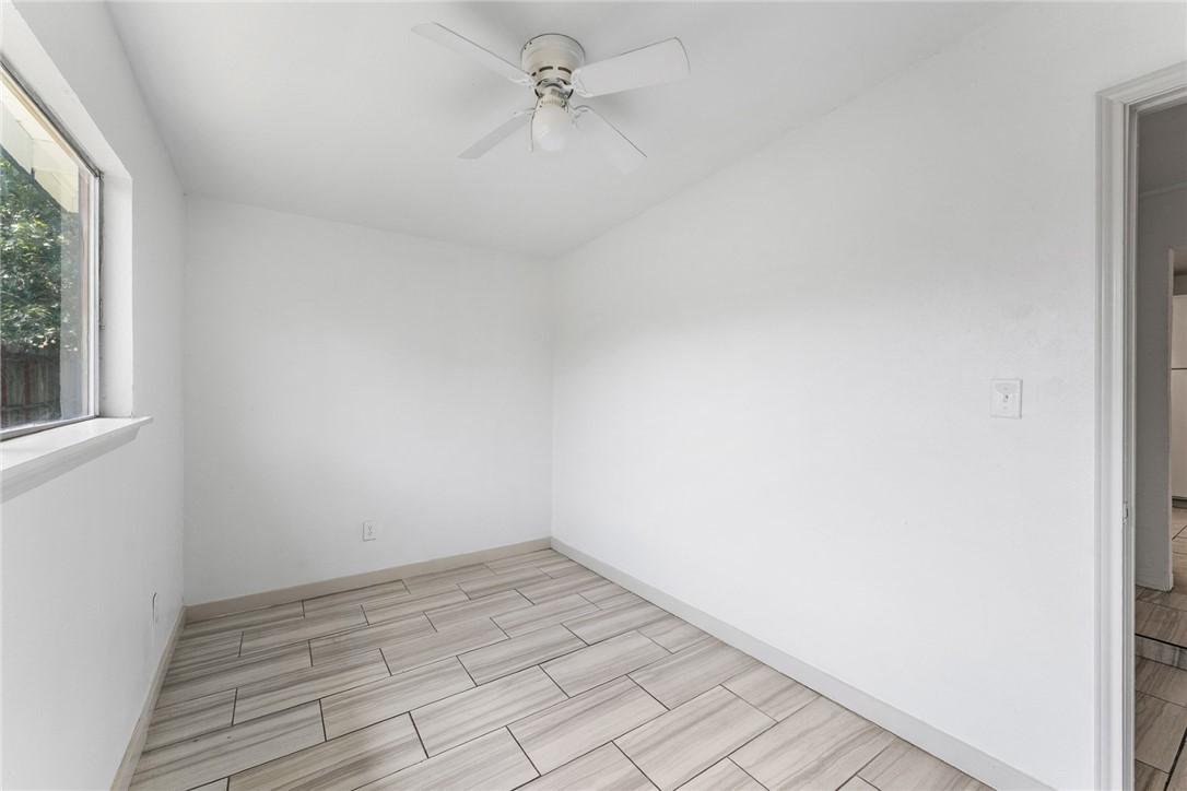 4917 Marion Circle Corpus Christi, TX 78411 - Photo 12 of 14 an empty room with a window