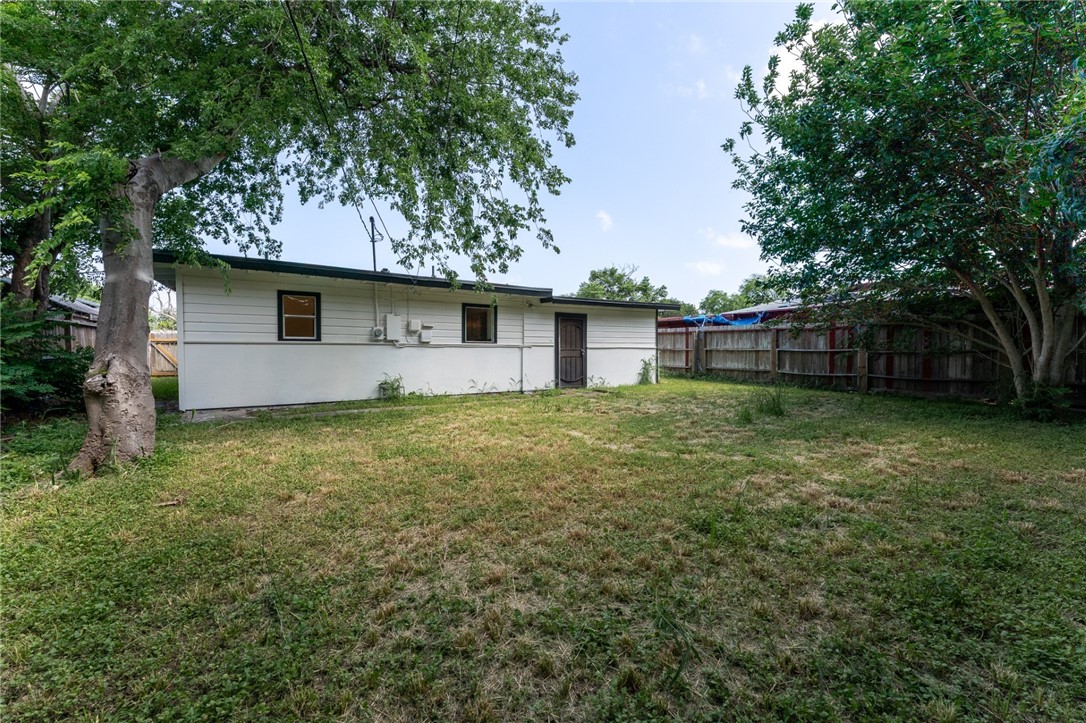 4917 Marion Circle Corpus Christi, TX 78411 - Photo 14 of 14 a backyard of a house with lots of green space