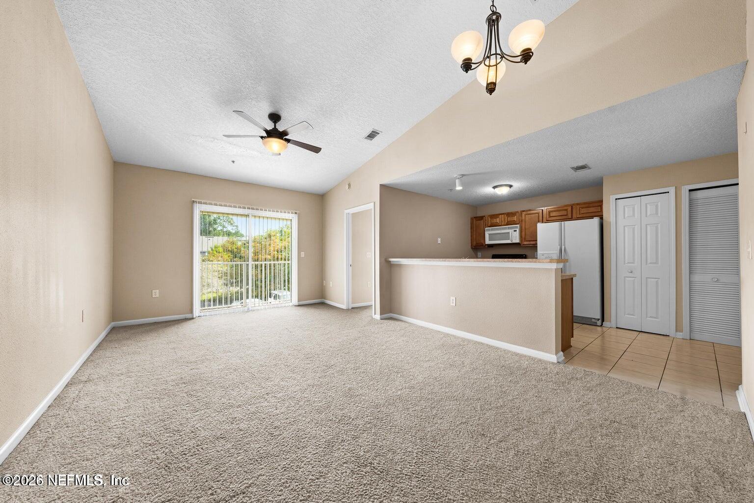 7920 Merrill Road, Unit 1713 Jacksonville, FL 32277 - Photo 8 of 8 living area and kitchen