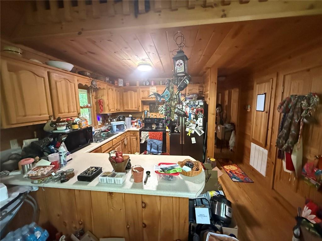 175 Antler Way Morganton, GA 30560 - Photo 5 of 8 a room with furniture and a kitchen view