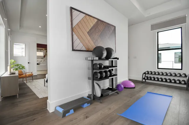 a view of utility room with a large window