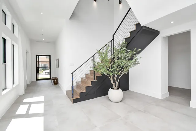 a view of entryway with stairs