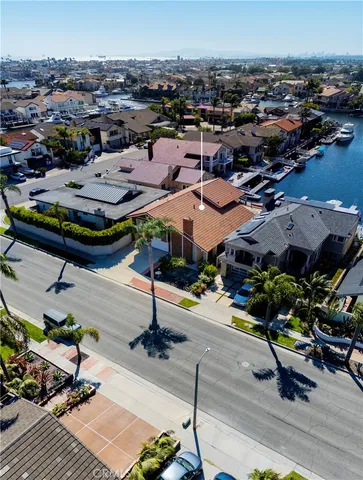 a view of a city that has lawn chairs