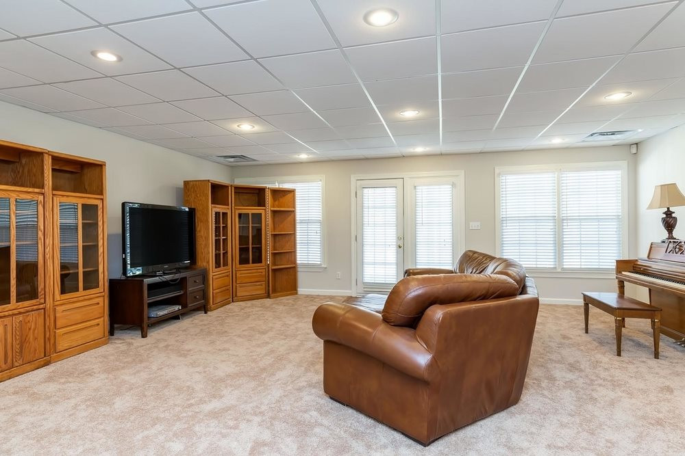 4401 Irene Way Raleigh, NC 27603 - Photo 18 of 30 Bonus Room on lower level would make a great Living Room space. Bonus Room