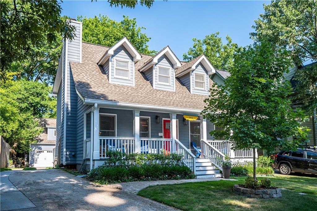 396 Cherokee Avenue Southeast Atlanta, GA 30312 - Photo 1 of 1 a front view of a house with garden