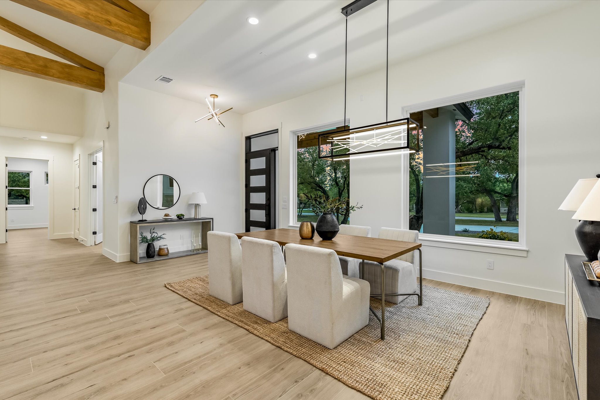 410 Shady Tree Drive Georgetown, TX 78633 - Photo 4 of 40 Dining room featuring recessed lighting, light wood finished floors, and vaulted ceiling with beams