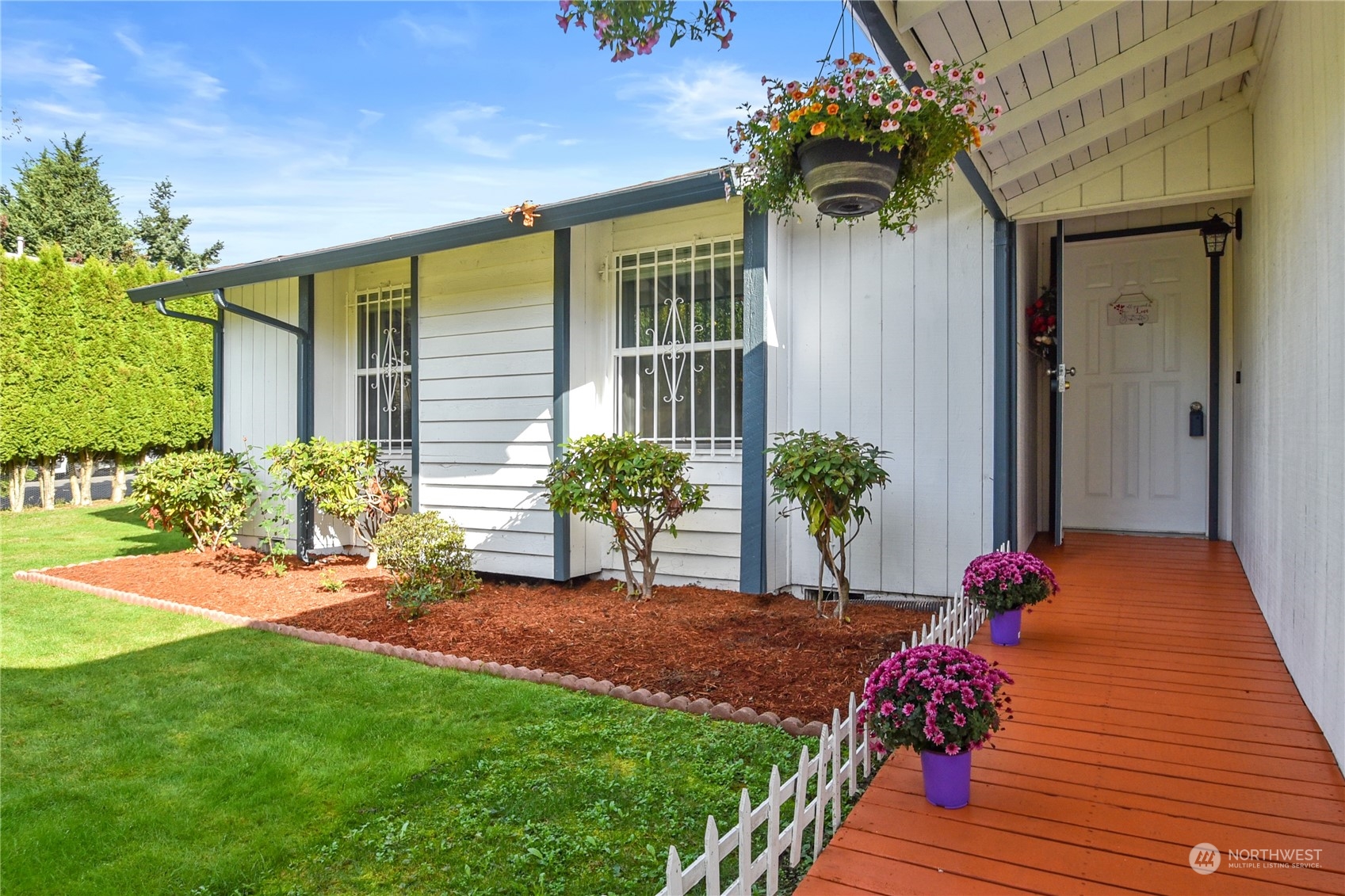 31108 11th Place Southwest Federal Way, WA 98023 - Photo 17 of 22 a front view of a house with wooden floor and a yard