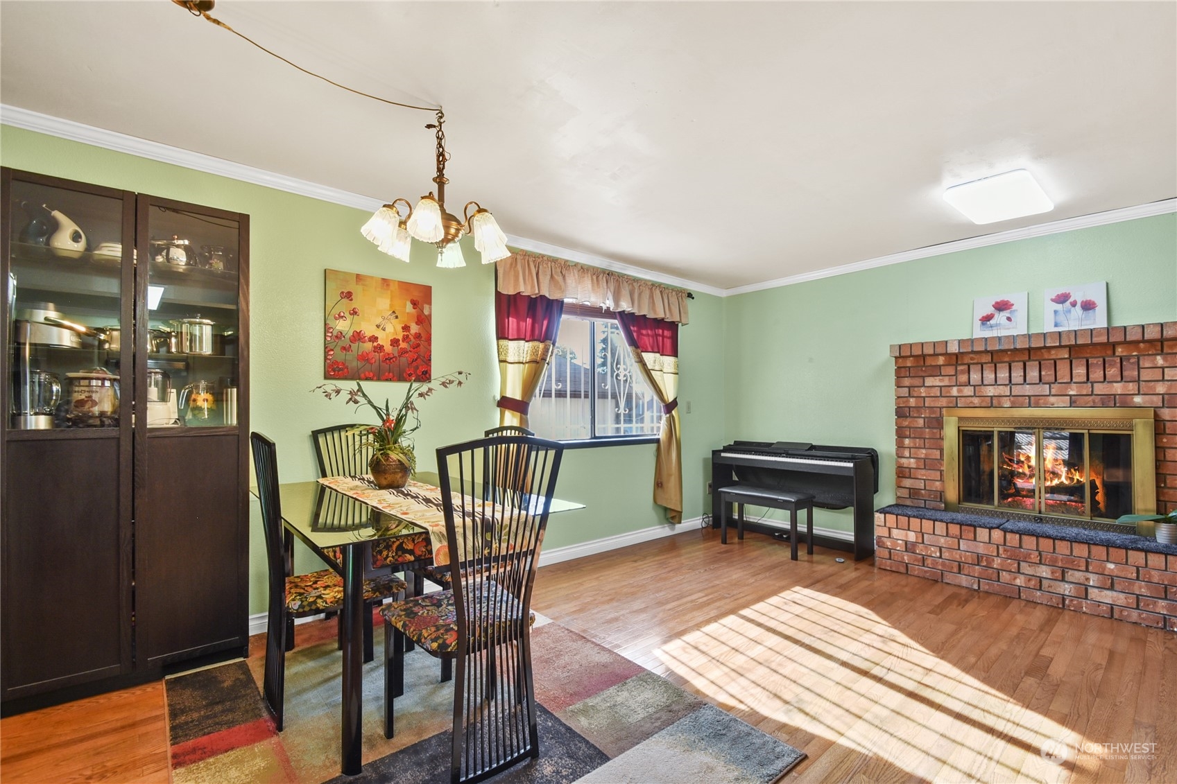 31108 11th Place Southwest Federal Way, WA 98023 - Photo 4 of 22 a view of a dining room with furniture window and wooden floor