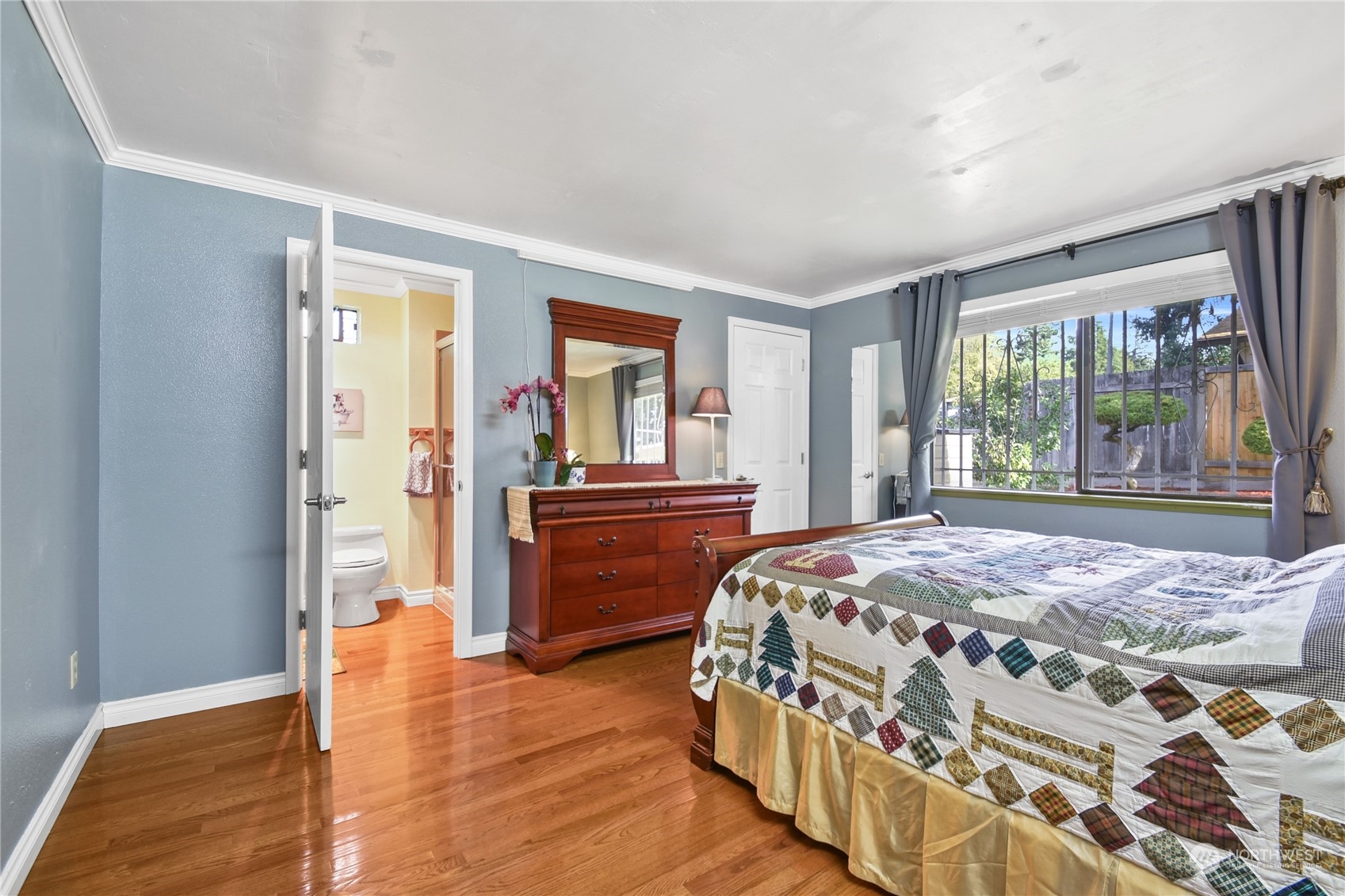 31108 11th Place Southwest Federal Way, WA 98023 - Photo 9 of 22 a bedroom with a bed and a dresser next to a window