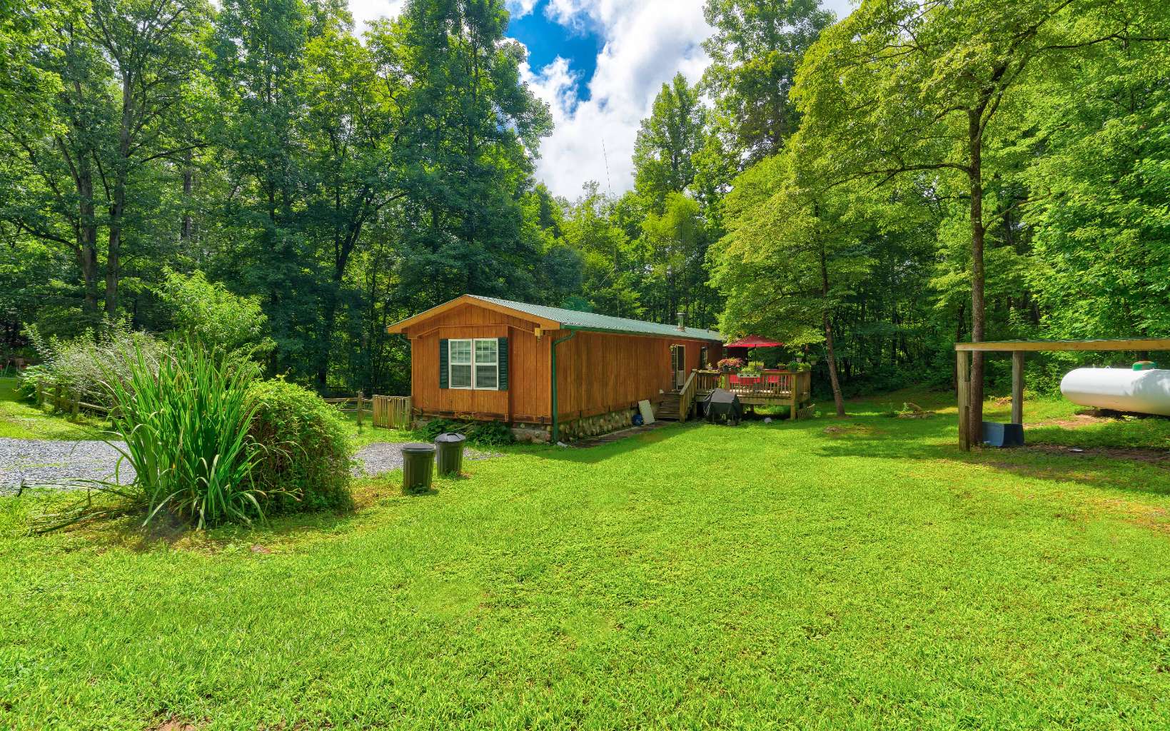 953 Liberty Road Royston, GA 30662 - Photo 1 of 1 a backyard of a house with seating space