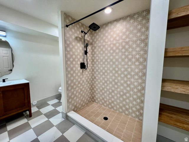 812 East Bates Cyn Road Tooele, UT 84074 - Photo 81 of 144 Contemporary walk-in shower featuring patterned wall tile and a slatted floor