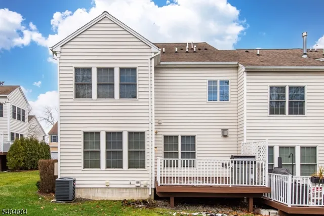a view of a house with a roof deck