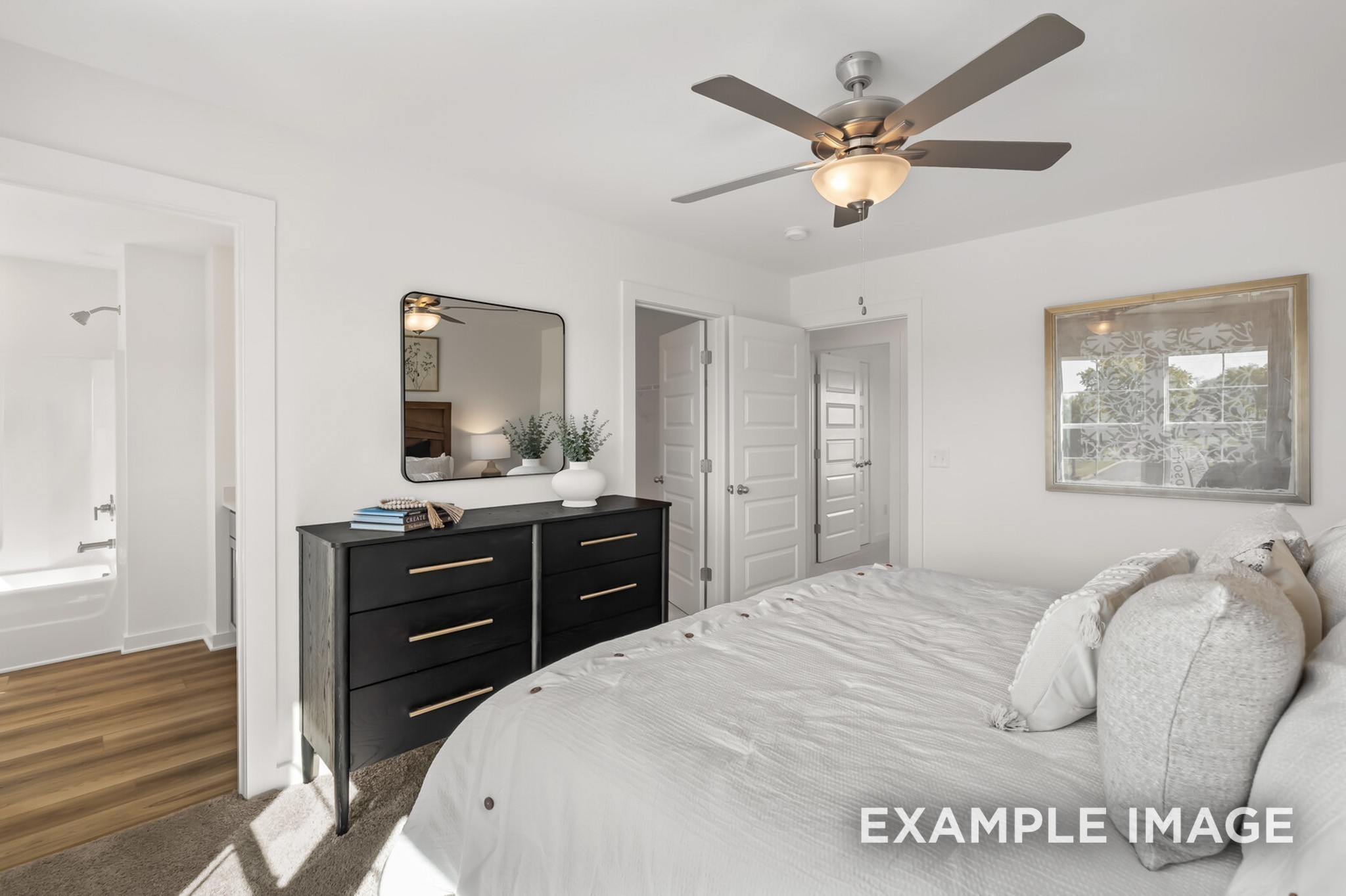 1721 Elliott Williams Way Gallatin, TN 37066 - Photo 16 of 22 a bedroom with a bed and a dresser