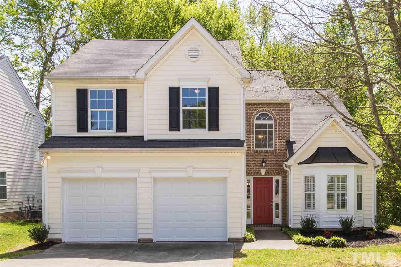 4628 Drewbridge Way Raleigh, NC 27604 - Photo 1 of 21 a front view of a house with a yard