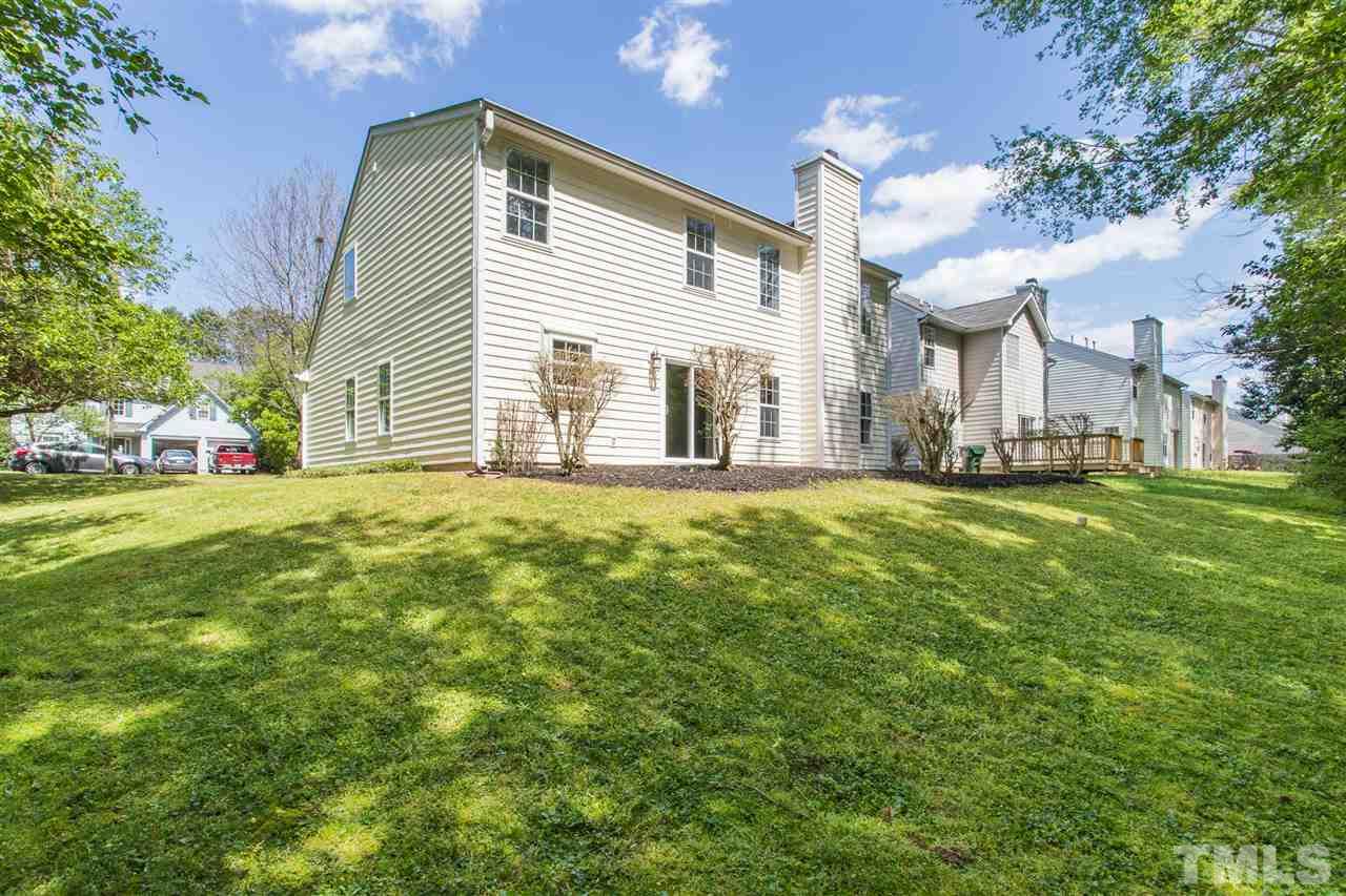 4628 Drewbridge Way Raleigh, NC 27604 - Photo 18 of 21 a view of a house with a yard