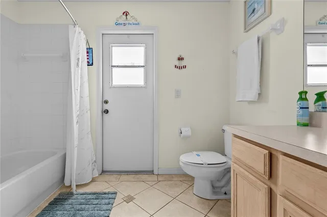 a bathroom with a sink a toilet and a bathtub