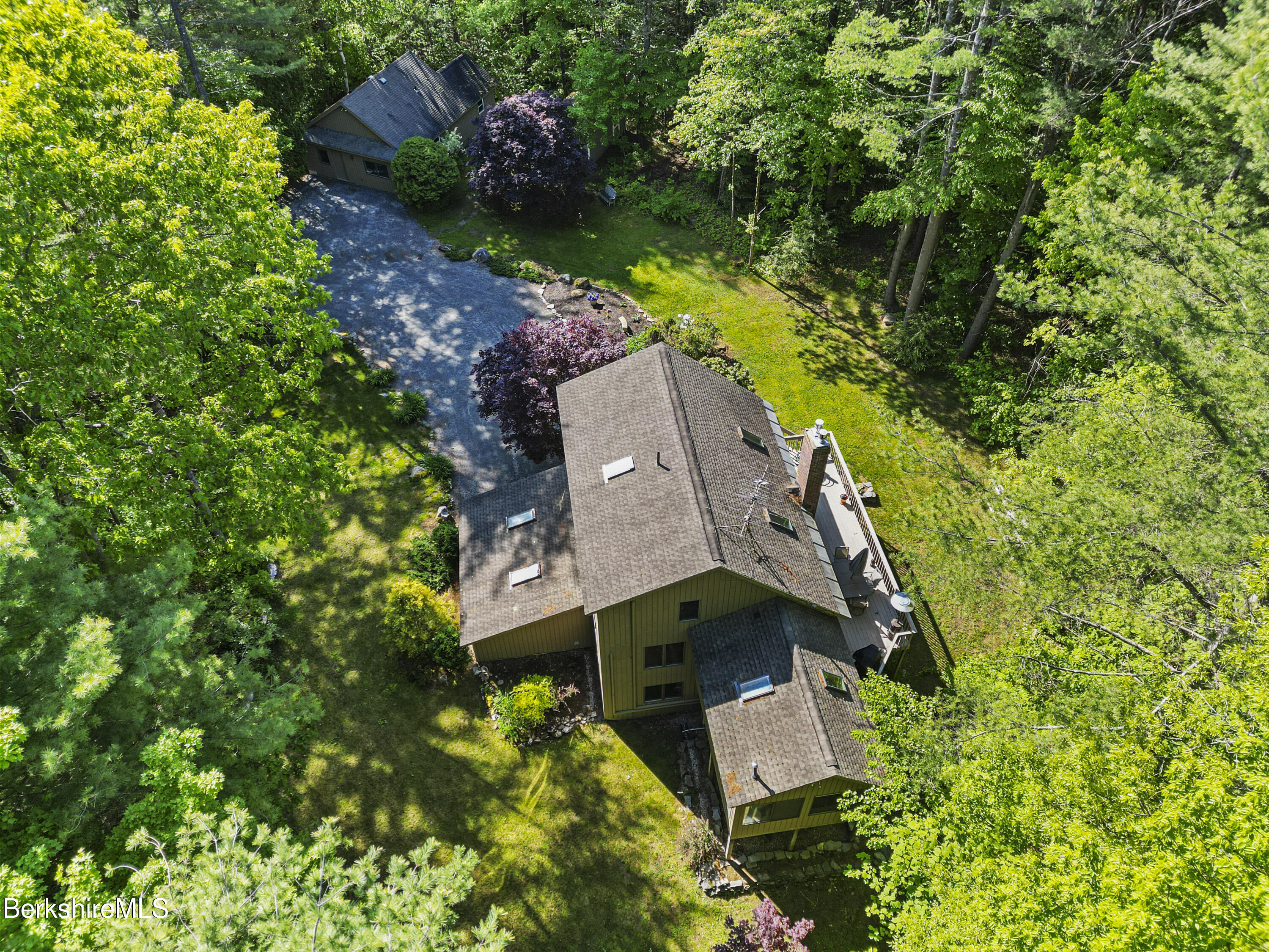 105 Harrington Road Otis, MA 01253 - Photo 3 of 68 an aerial view of a house with a garden