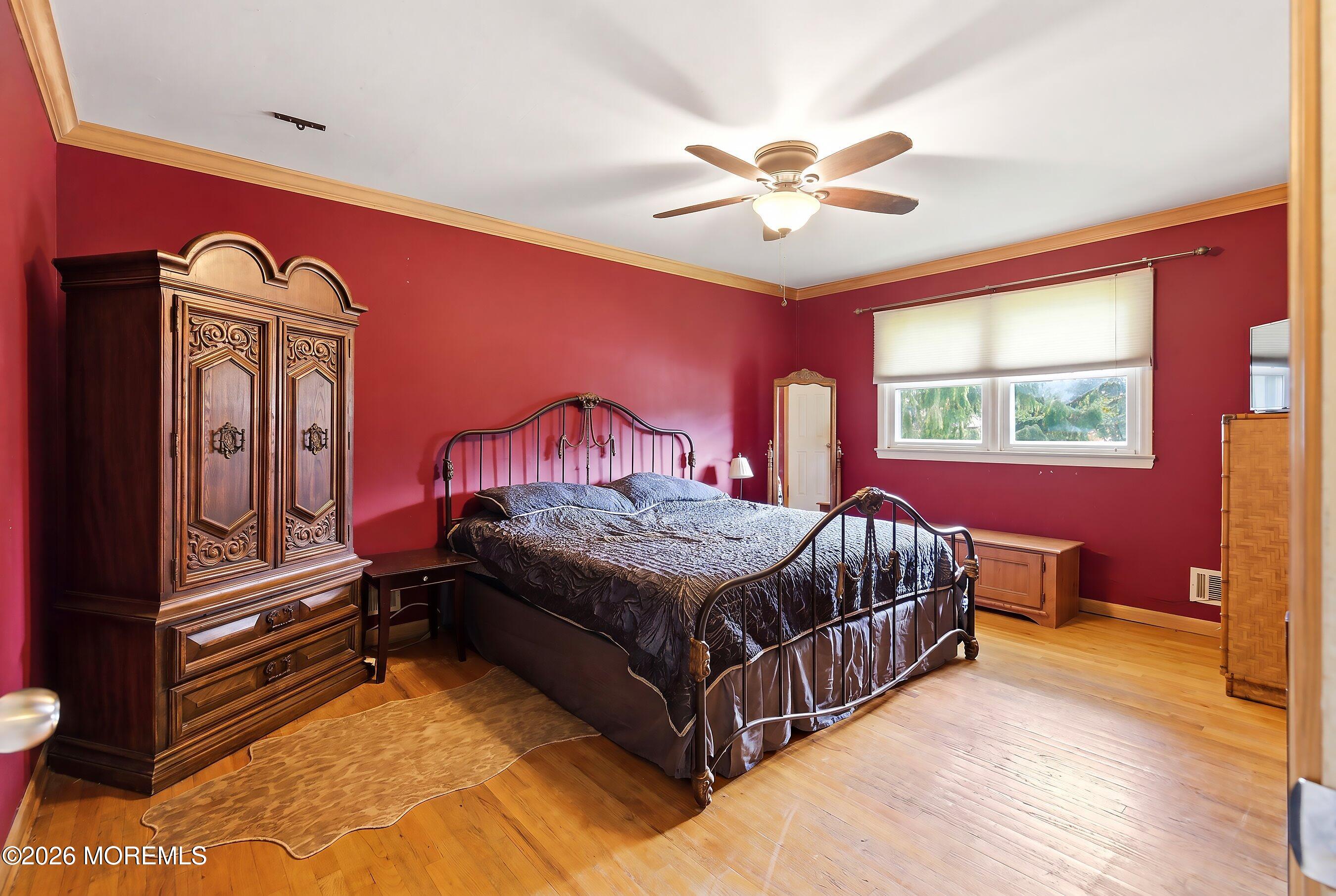 822 York Road Brick, NJ 08724 - Photo 17 of 37 a bedroom with a bed and wooden floor