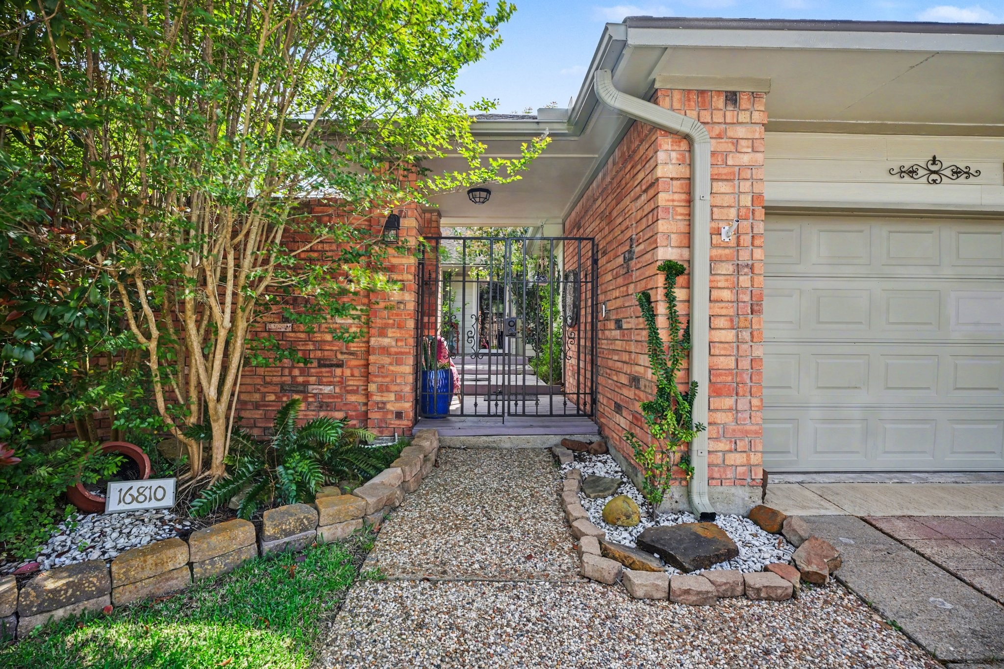 Welcome to this sought-after Clear Lake/NASA area neighborhood featuring an updated 2-bedroom patio home with a beautiful wrought iron gate.