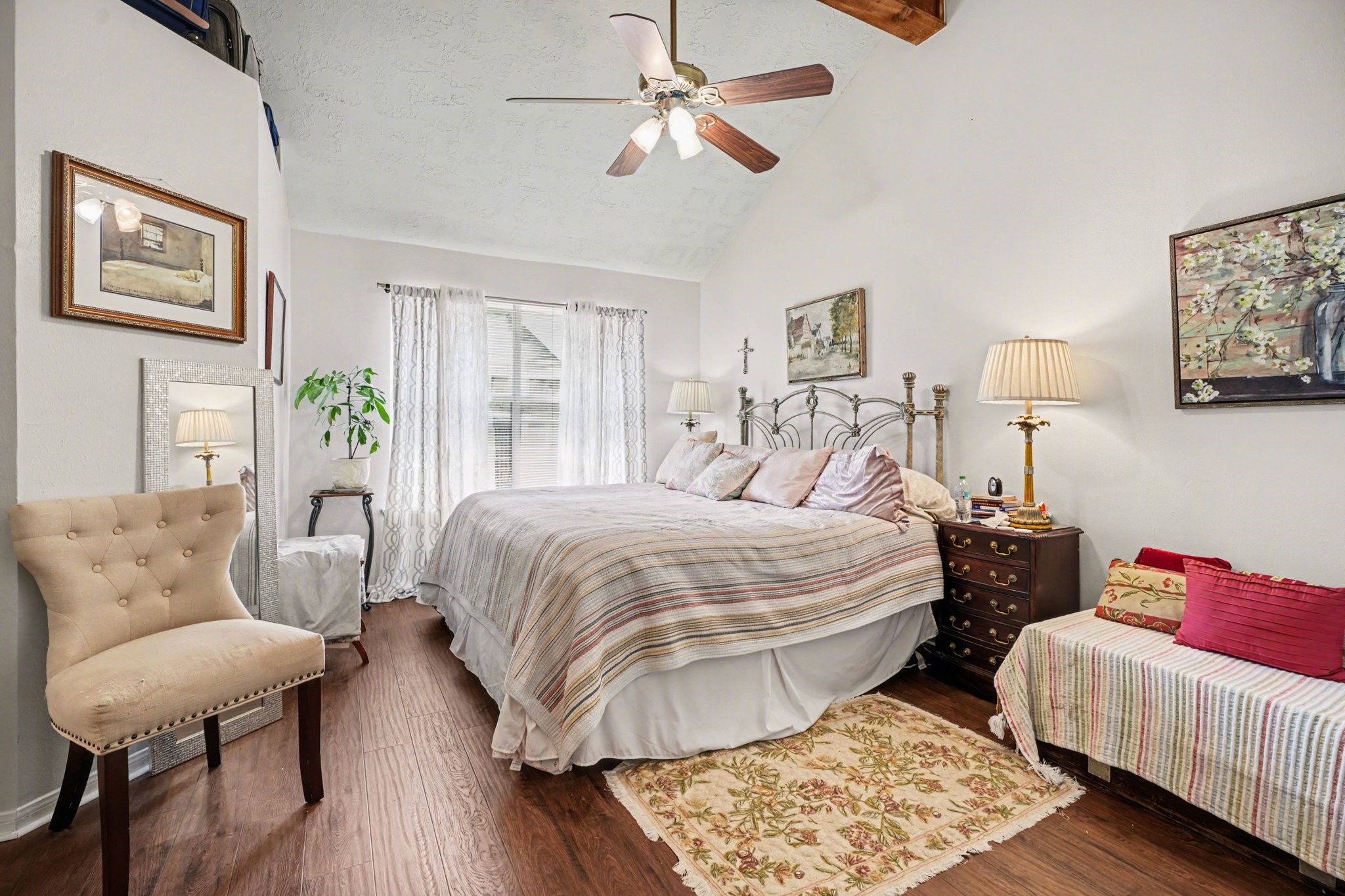 16810 Finewood Way Houston, TX 77058 - Photo 16 of 23 Primary bedroom with en suite bathroom, comfortably furnished with oversized pieces—offering plenty of space while still feeling warm and inviting.