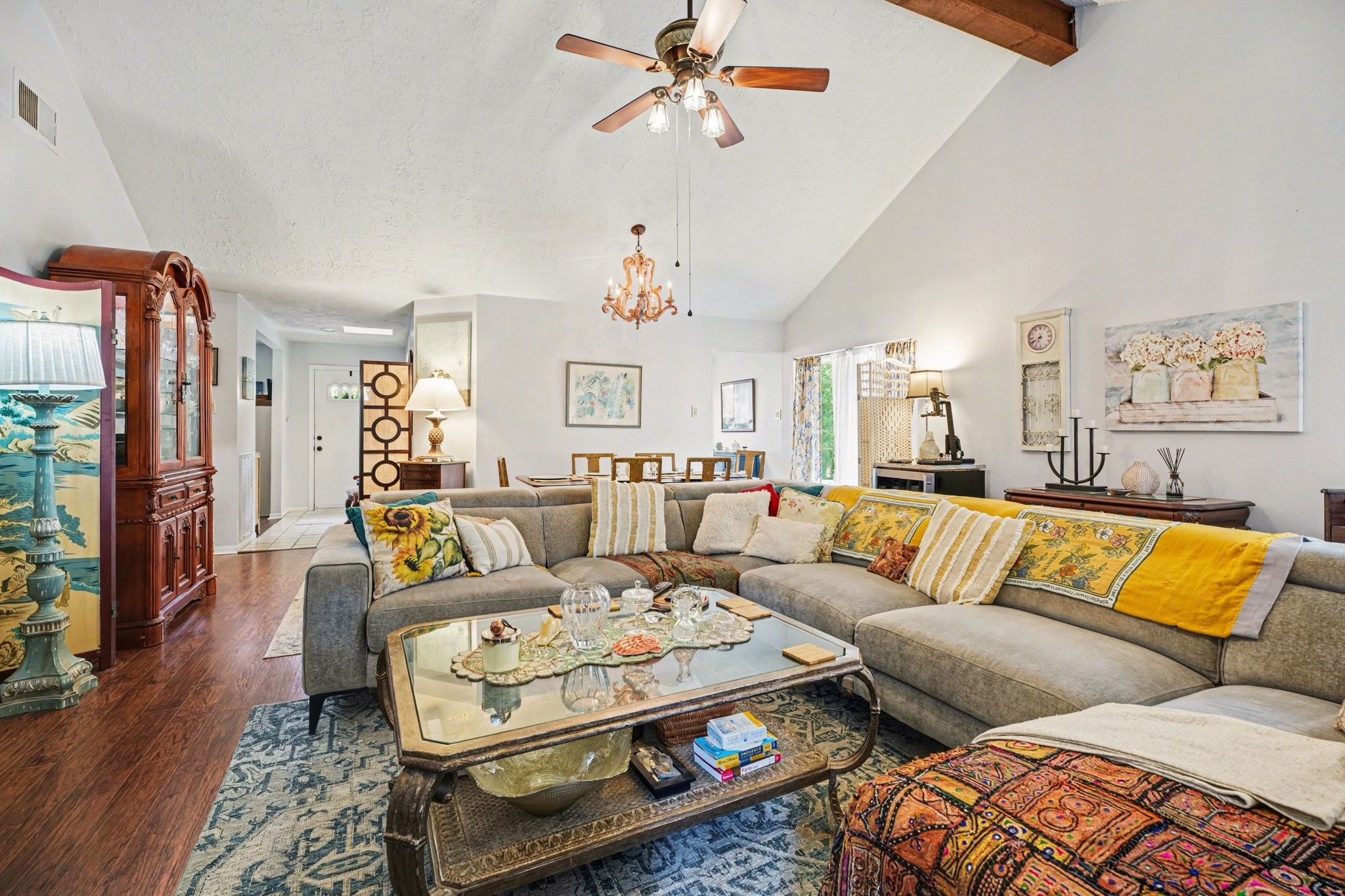 16810 Finewood Way Houston, TX 77058 - Photo 8 of 23 Spacious den with soaring vaulted ceilings, exposed wood beams, and room for large furnishings.