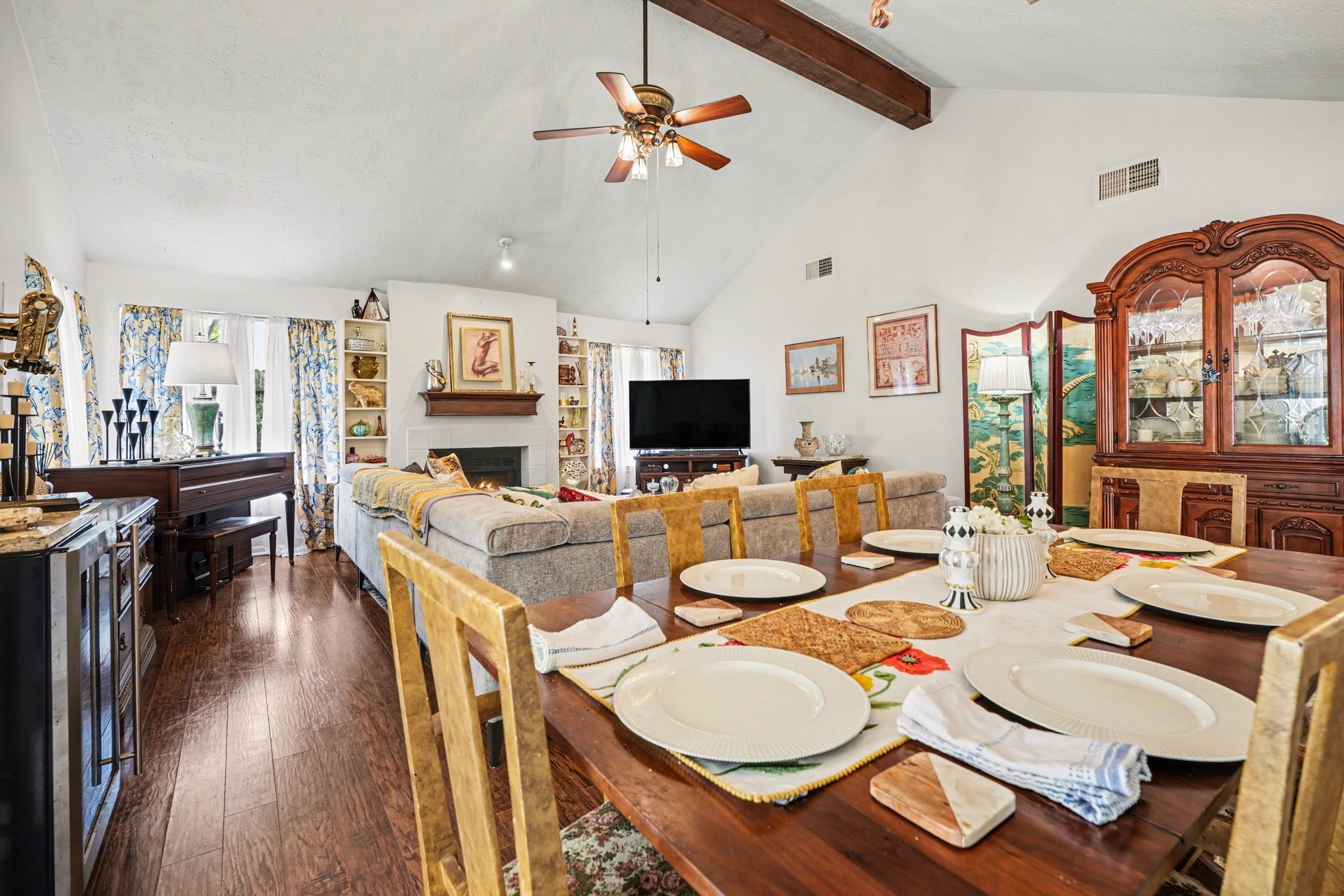 16810 Finewood Way Houston, TX 77058 - Photo 10 of 23 This homeowner has thoughtfully designed the space to accommodate a six-person dining table, wine refrigerator, large sectional, china cabinet, entertainment center, and even a grand piano.