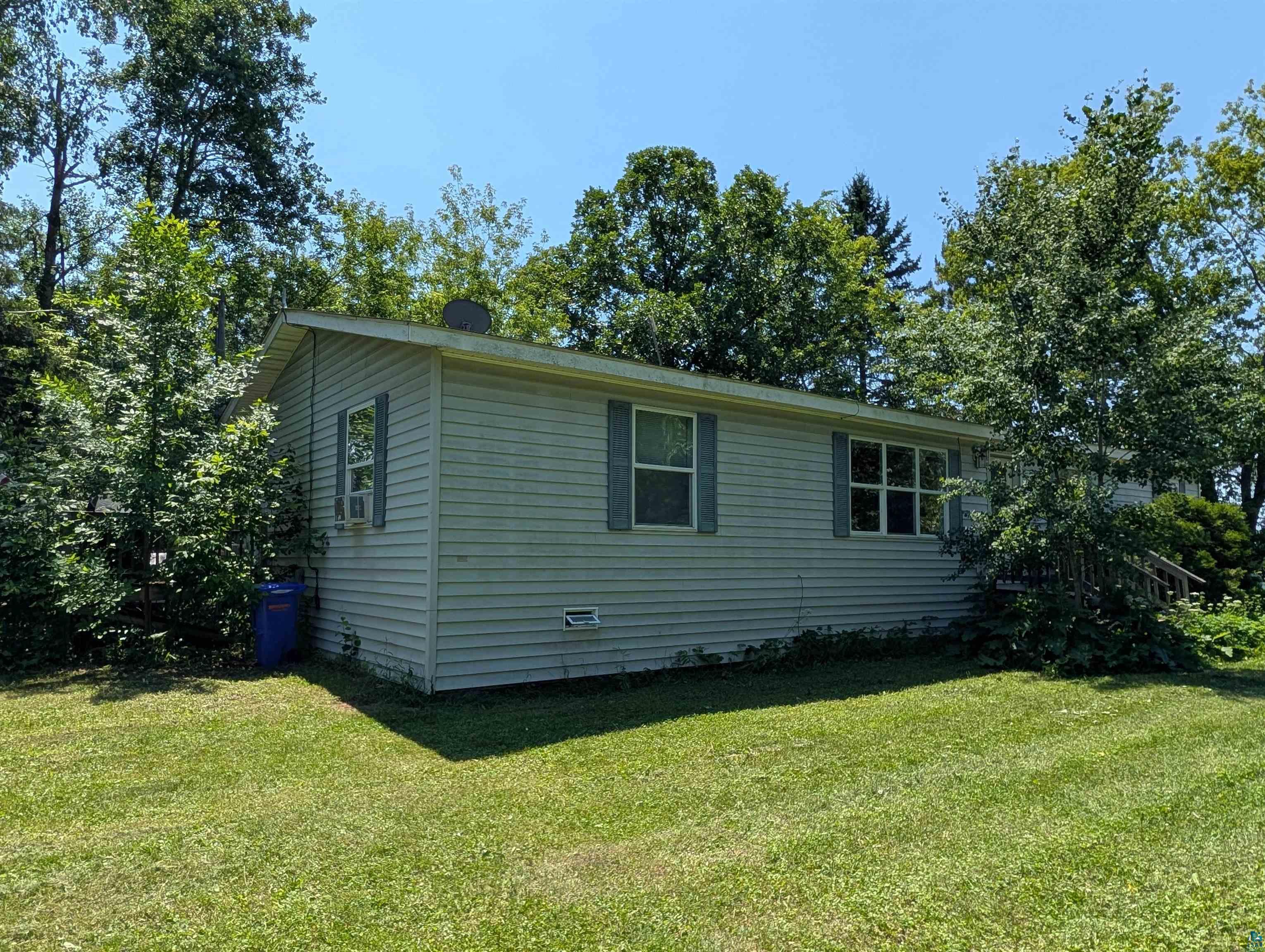 3945 Maple Street Kettle River, MN 55757 - Photo 37 of 41 Single-story property with horizontal siding and a gabled roofline