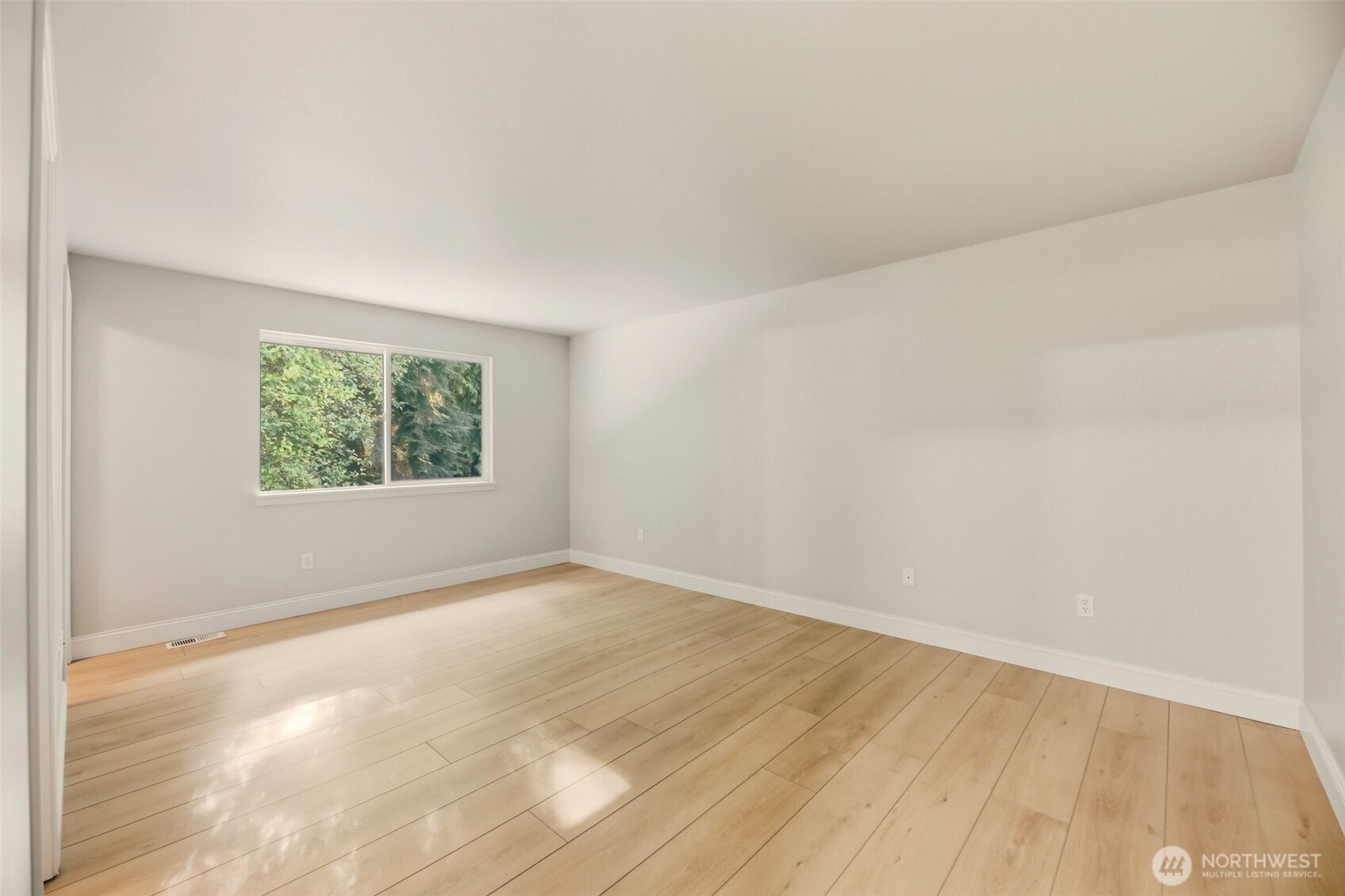 13117 Tonga Ridge Road Southeast Monroe, WA 98272 - Photo 15 of 40 an empty room with a window