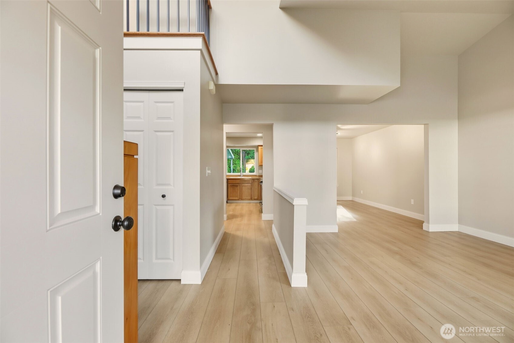 13117 Tonga Ridge Road Southeast Monroe, WA 98272 - Photo 23 of 40 a view of a hallway with wooden floor and entryway