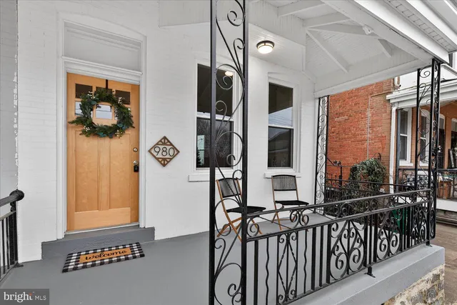 a view of balcony with furniture