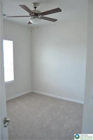 a view of a window in an empty room