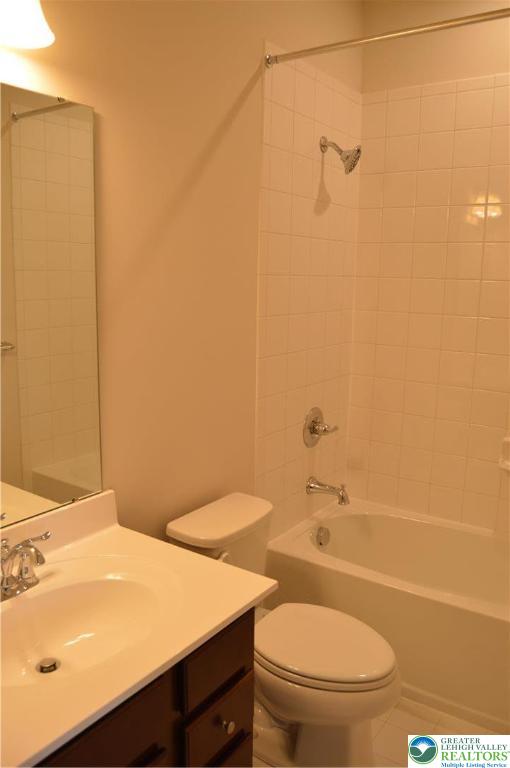 2332 Raya Way Easton, PA 18045 - Photo 13 of 14 a bathroom with a sink a toilet and shower