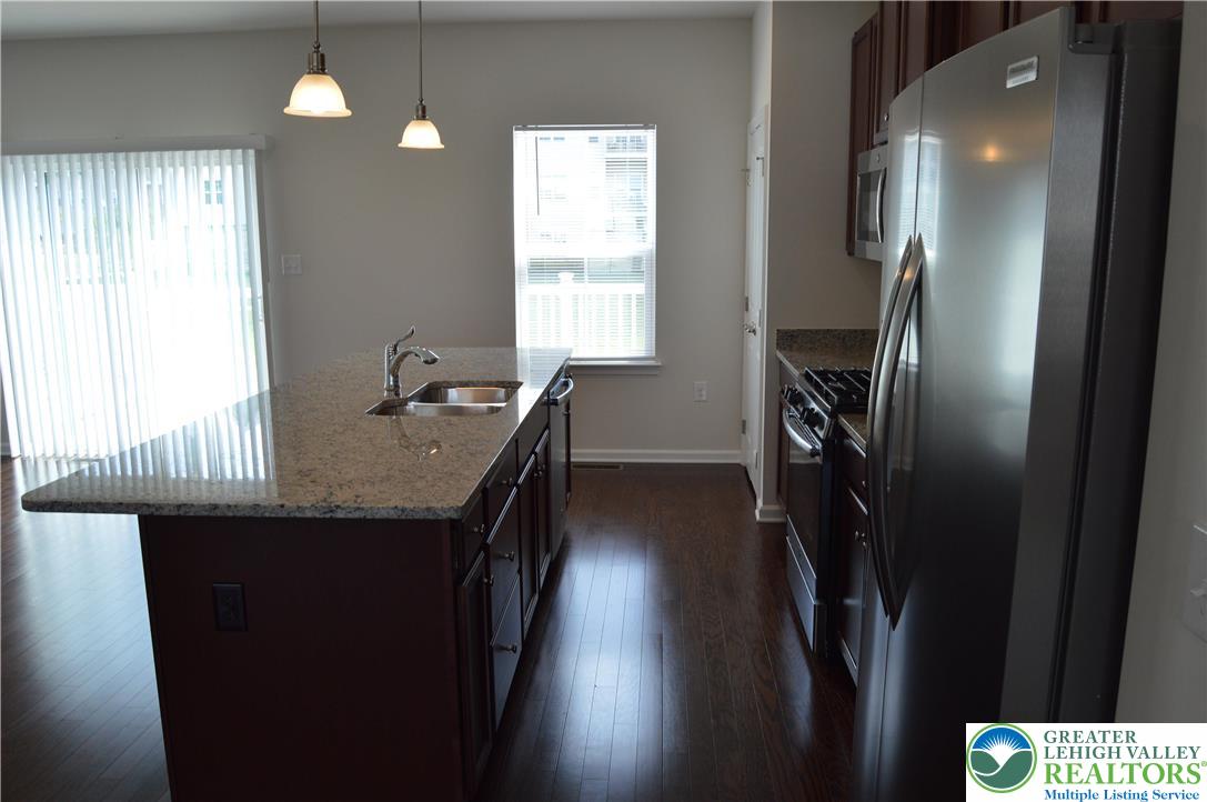2332 Raya Way Easton, PA 18045 - Photo 6 of 14 a kitchen with refrigerator and window