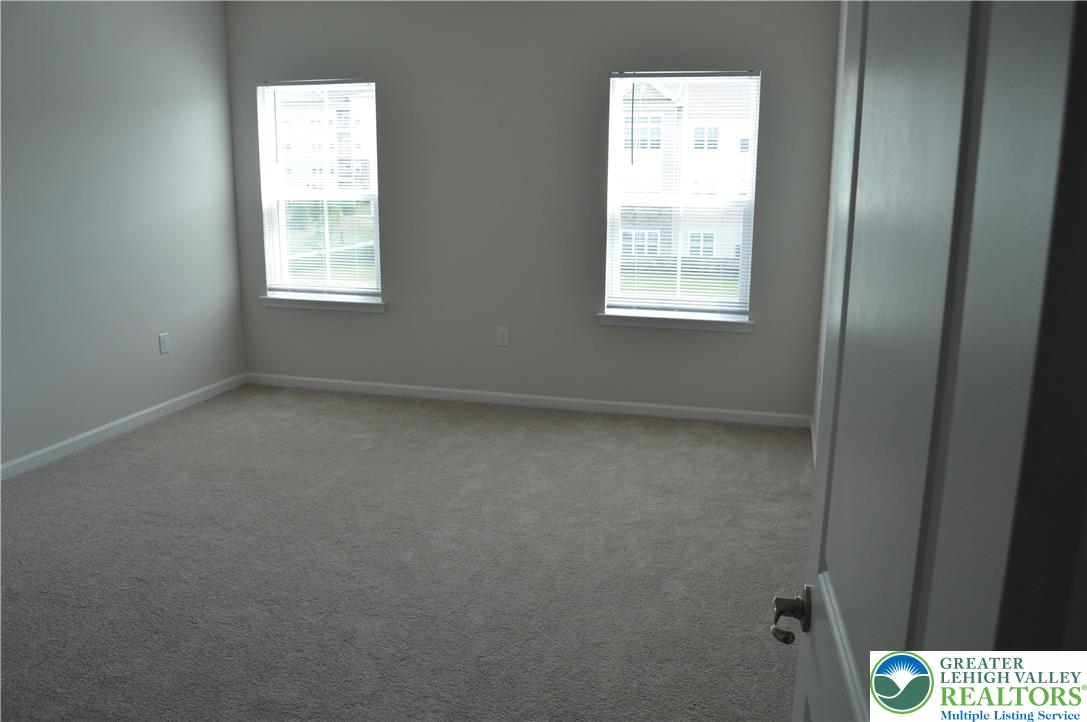 2332 Raya Way Easton, PA 18045 - Photo 9 of 14 an empty room with windows