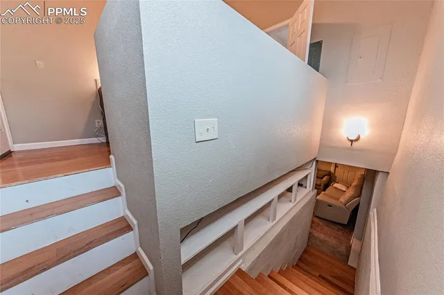 a view of bedroom and staircase