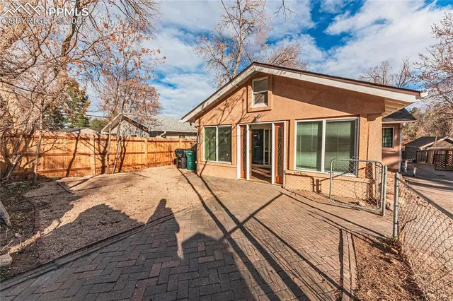 a view of a house with a large window
