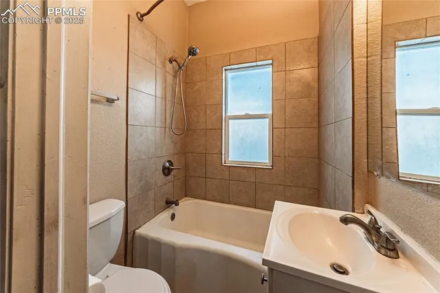 a bathroom with a sink and a toilet