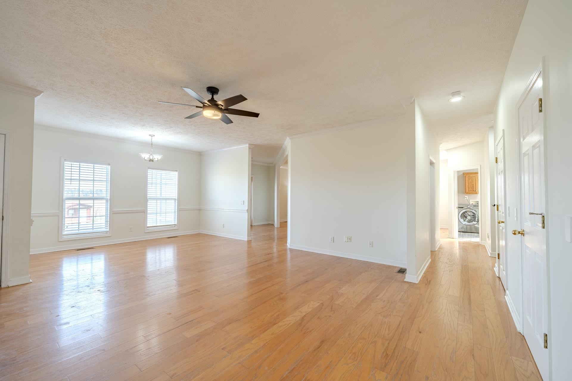 185 Leath Lane Finger, TN 38334 - Photo 13 of 34 a view of an empty room with window and wooden floor