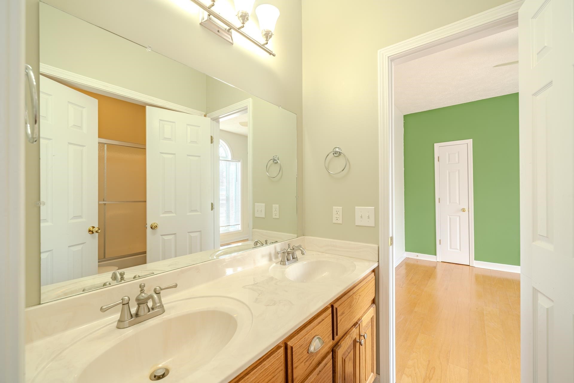 185 Leath Lane Finger, TN 38334 - Photo 18 of 34 a bathroom with a granite countertop sink and a mirror