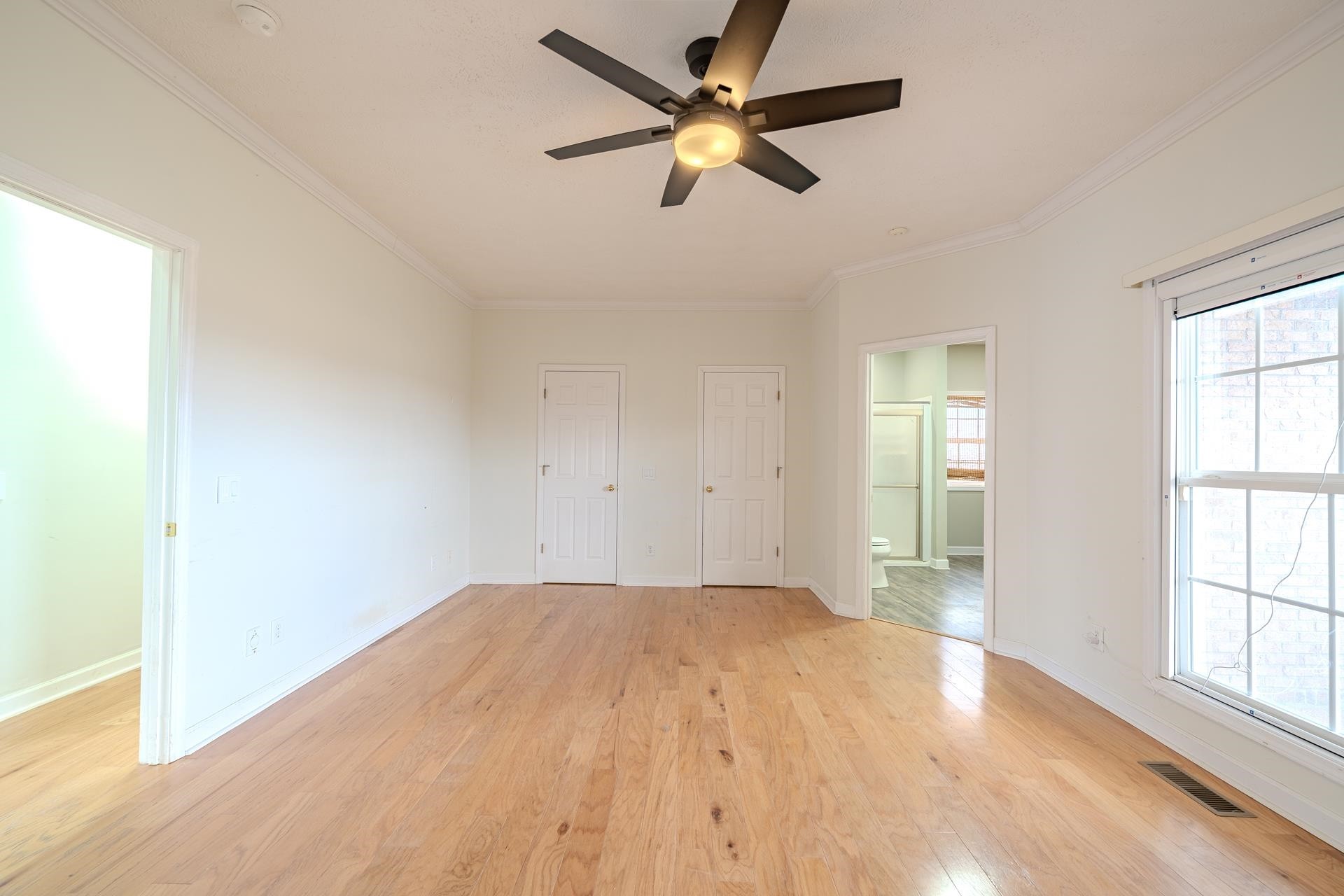 185 Leath Lane Finger, TN 38334 - Photo 19 of 34 wooden floor in an empty room with a window