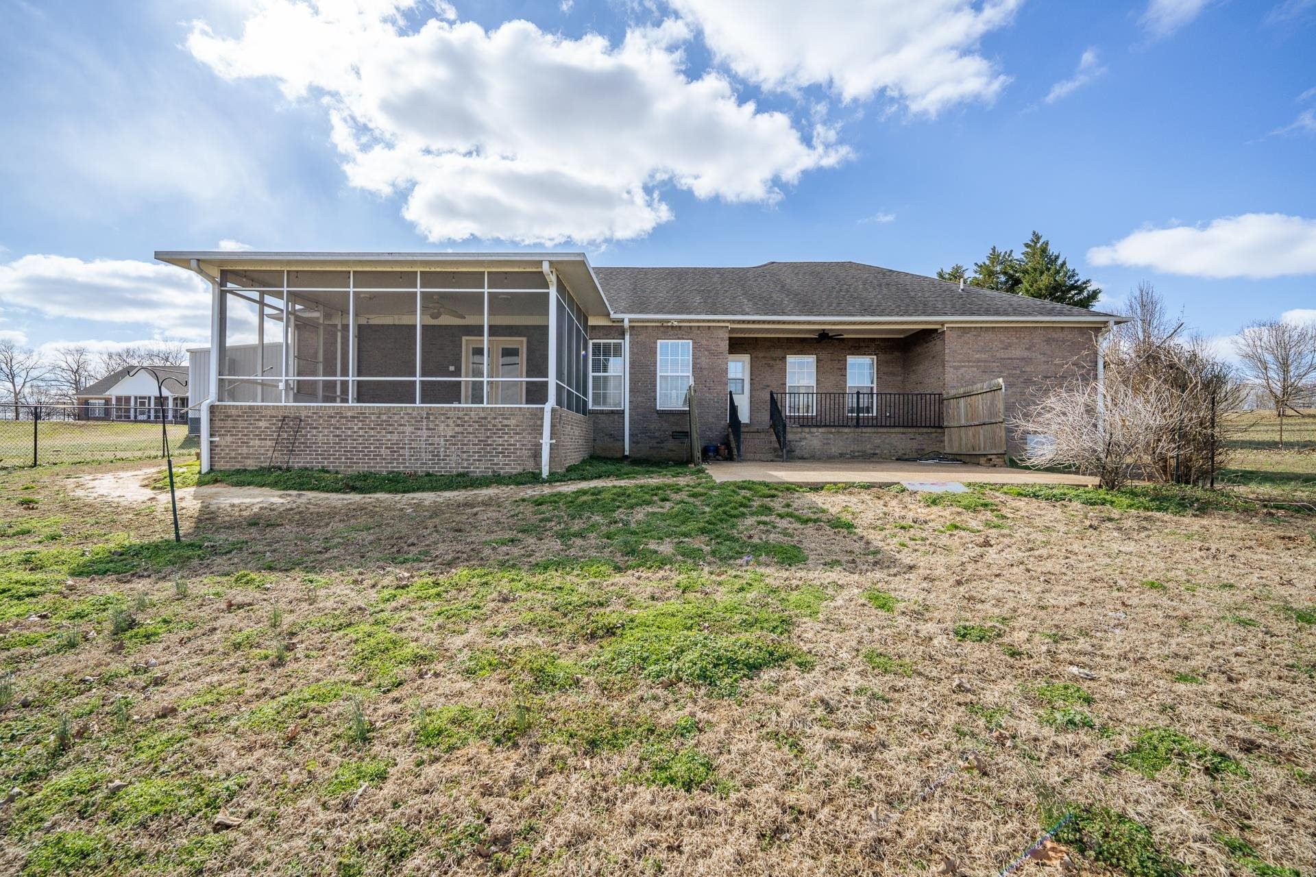 185 Leath Lane Finger, TN 38334 - Photo 27 of 34 a front view of a house with a yard