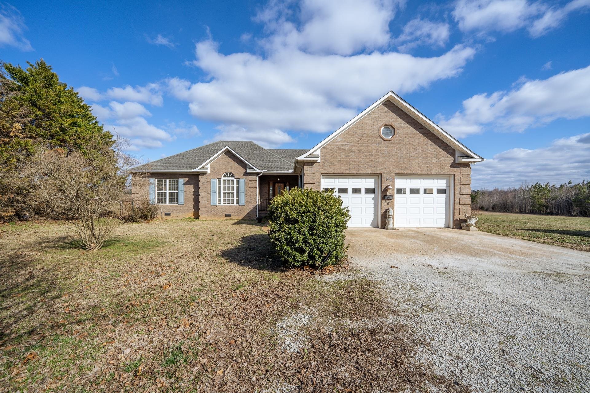 185 Leath Lane Finger, TN 38334 - Photo 3 of 34 a view of a house with a yard