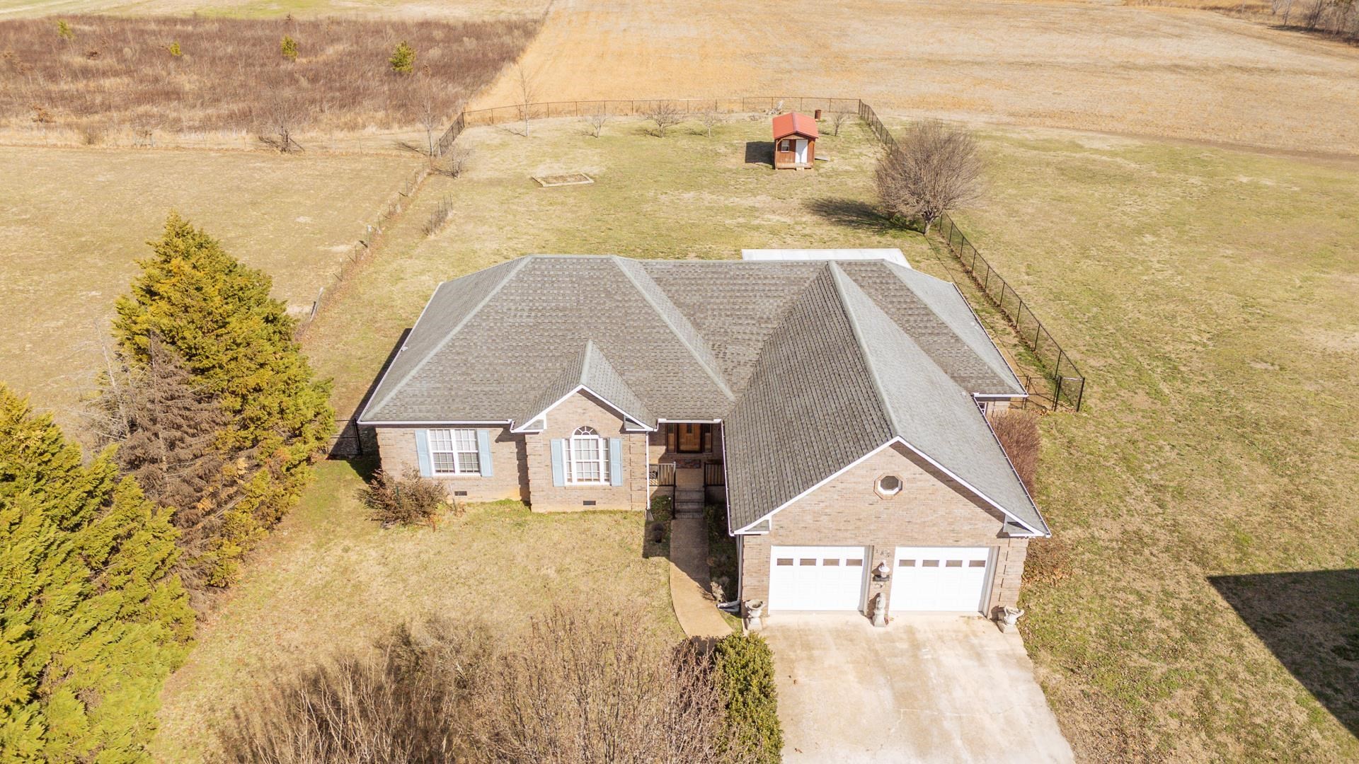 185 Leath Lane Finger, TN 38334 - Photo 5 of 34 a aerial view of a house with a yard
