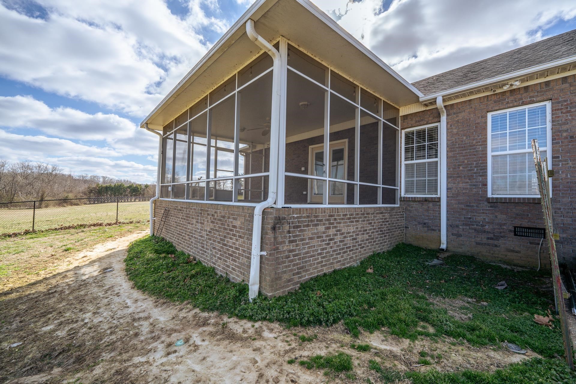 185 Leath Lane Finger, TN 38334 - Photo 6 of 34 a front view of a house with garden